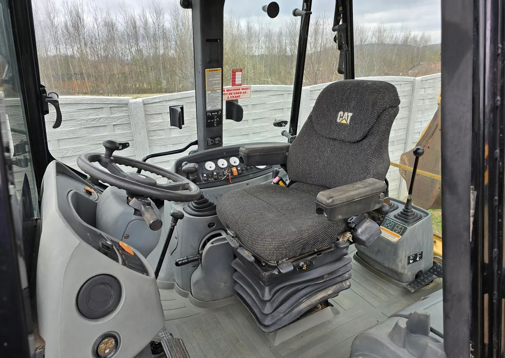 Caterpillar - Máy xúc trước múc sau: hình 2 Caterpillar - Máy xúc trước múc sau: hình 2