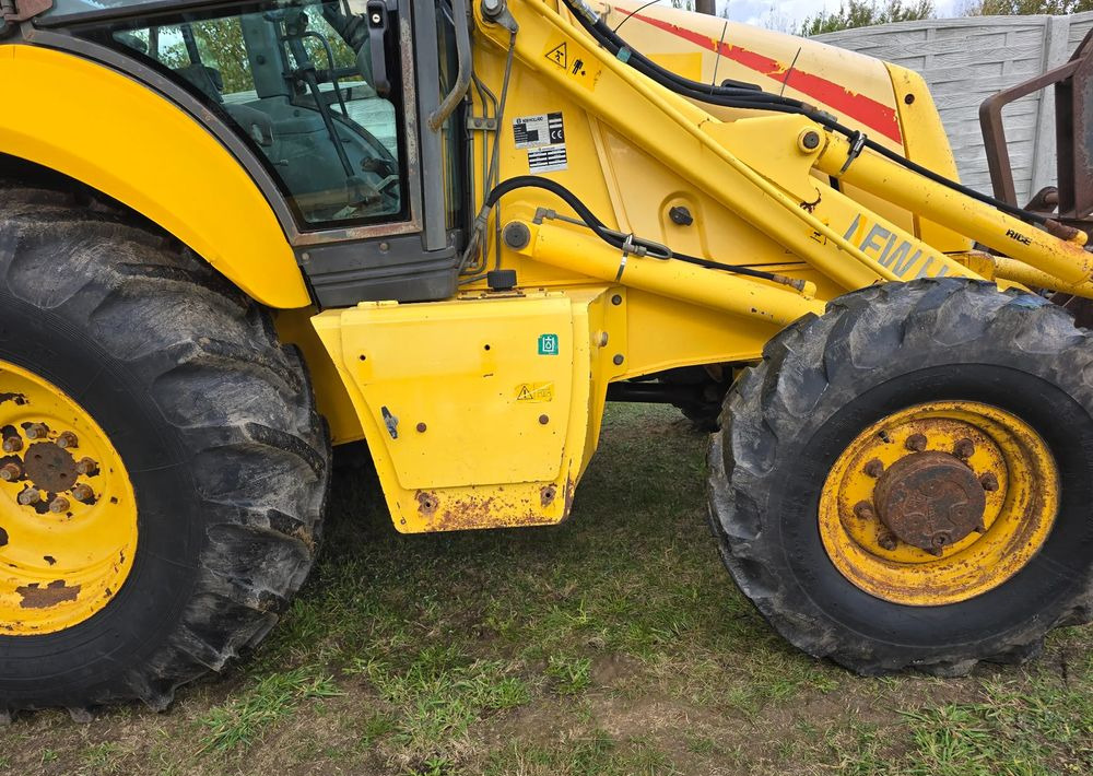Máy xúc trước múc sau New Holland: hình 8 Máy xúc trước múc sau New Holland: hình 8
