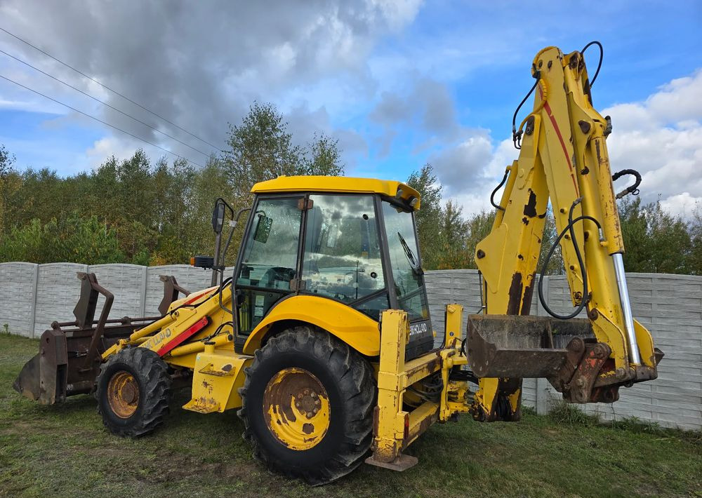 Máy xúc trước múc sau New Holland: hình 6 Máy xúc trước múc sau New Holland: hình 6