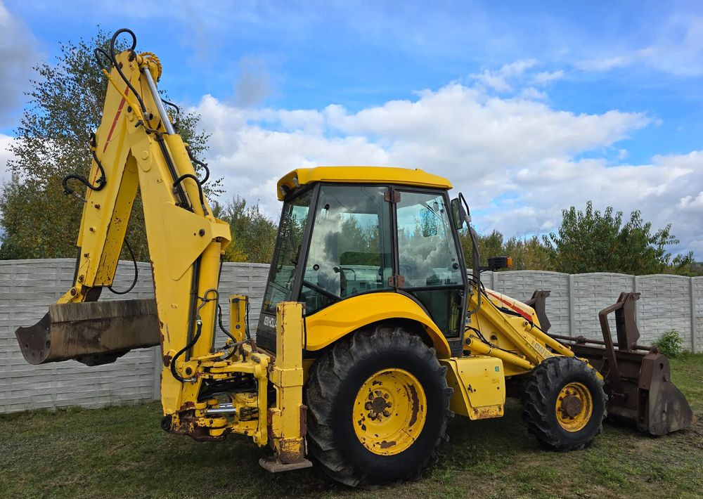 Máy xúc trước múc sau New Holland: hình 7 Máy xúc trước múc sau New Holland: hình 7