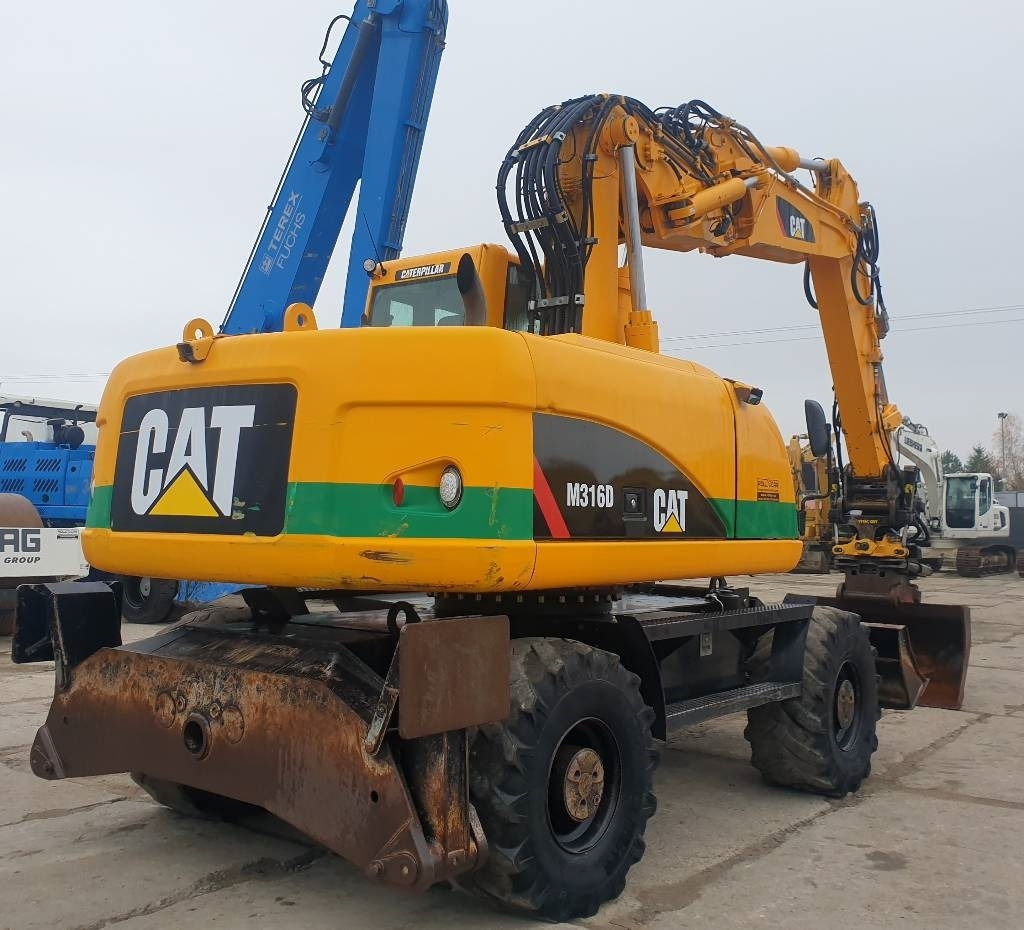 CAT M 316 D - Máy xúc bánh lốp: hình 3 CAT M 316 D - Máy xúc bánh lốp: hình 3