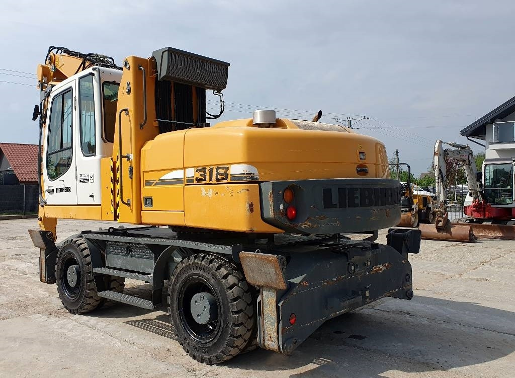 Liebherr A 316 Litronic - Máy cạp rác/ Công nghiệp: hình 2 Liebherr A 316 Litronic - Máy cạp rác/ Công nghiệp: hình 2