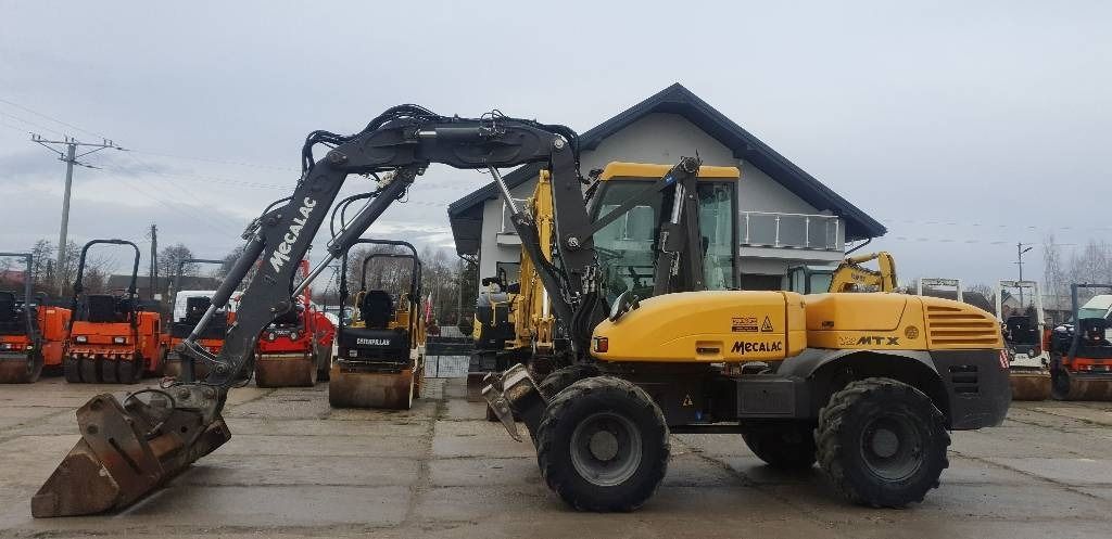 Mecalac 12 M TX - Máy xúc bánh lốp: hình 2 Mecalac 12 M TX - Máy xúc bánh lốp: hình 2