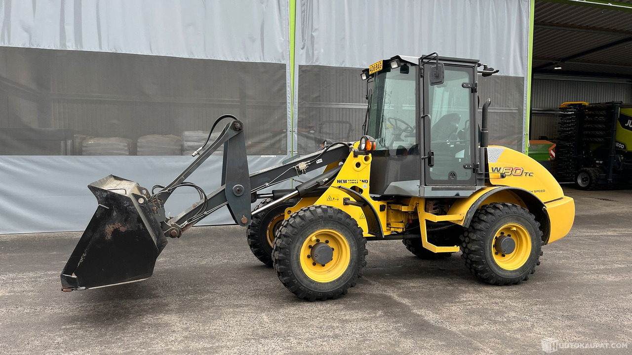 New Holland W80 TC HIGHSP, 2008, pyöräkuormaaja, Seinäjoki - Máy móc nông nghiệp: hình 1 New Holland W80 TC HIGHSP, 2008, pyöräkuormaaja, Seinäjoki - Máy móc nông nghiệp: hình 1