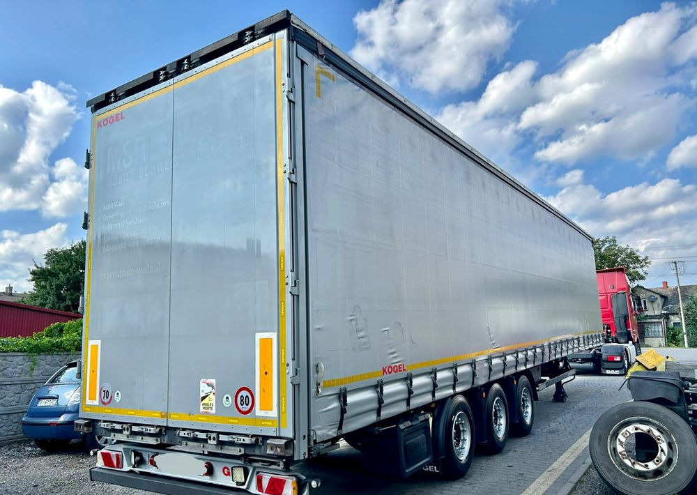Kögel MEGA 2019 OPONY 80% SAF PODNOSZONA OŚ PODNOSZONY DACH / OD PIERWSZEGO WŁAŚCICIELA - Sơ mi rơ moóc mui bạt: hình 3 Kögel MEGA 2019 OPONY 80% SAF PODNOSZONA OŚ PODNOSZONY DACH / OD PIERWSZEGO WŁAŚCICIELA - Sơ mi rơ moóc mui bạt: hình 3