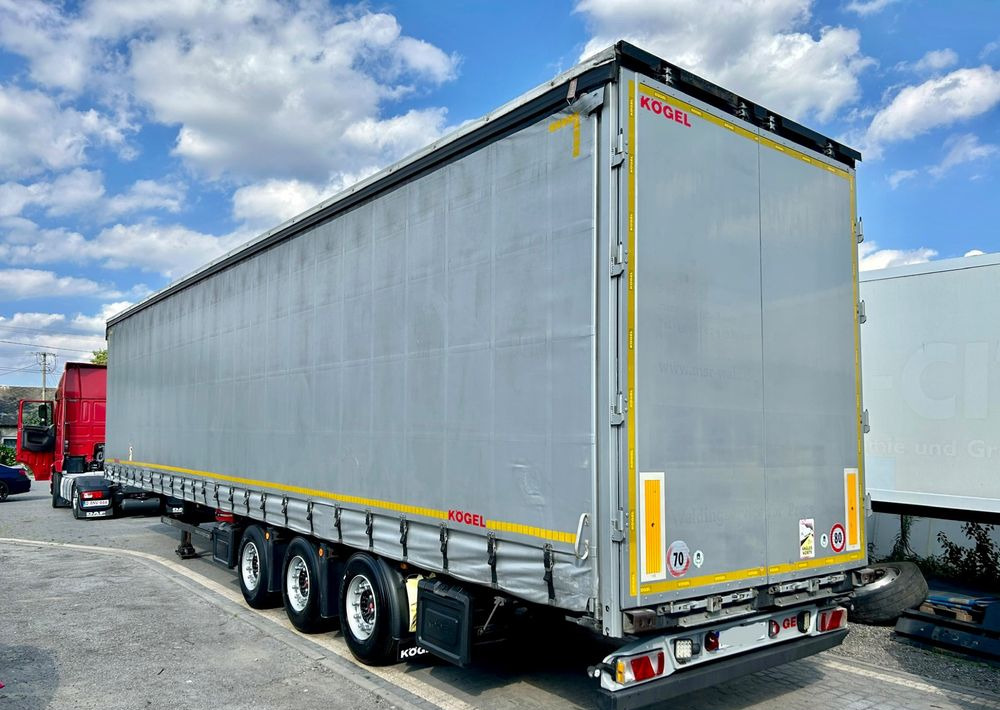 Kögel MEGA 2019 OPONY 80% SAF PODNOSZONA OŚ PODNOSZONY DACH / OD PIERWSZEGO WŁAŚCICIELA - Sơ mi rơ moóc mui bạt: hình 2 Kögel MEGA 2019 OPONY 80% SAF PODNOSZONA OŚ PODNOSZONY DACH / OD PIERWSZEGO WŁAŚCICIELA - Sơ mi rơ moóc mui bạt: hình 2
