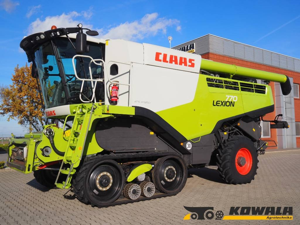 Claas Lexion 770TT 4x4 + V1200 - Máy gặt đập: hình 1 Claas Lexion 770TT 4x4 + V1200 - Máy gặt đập: hình 1