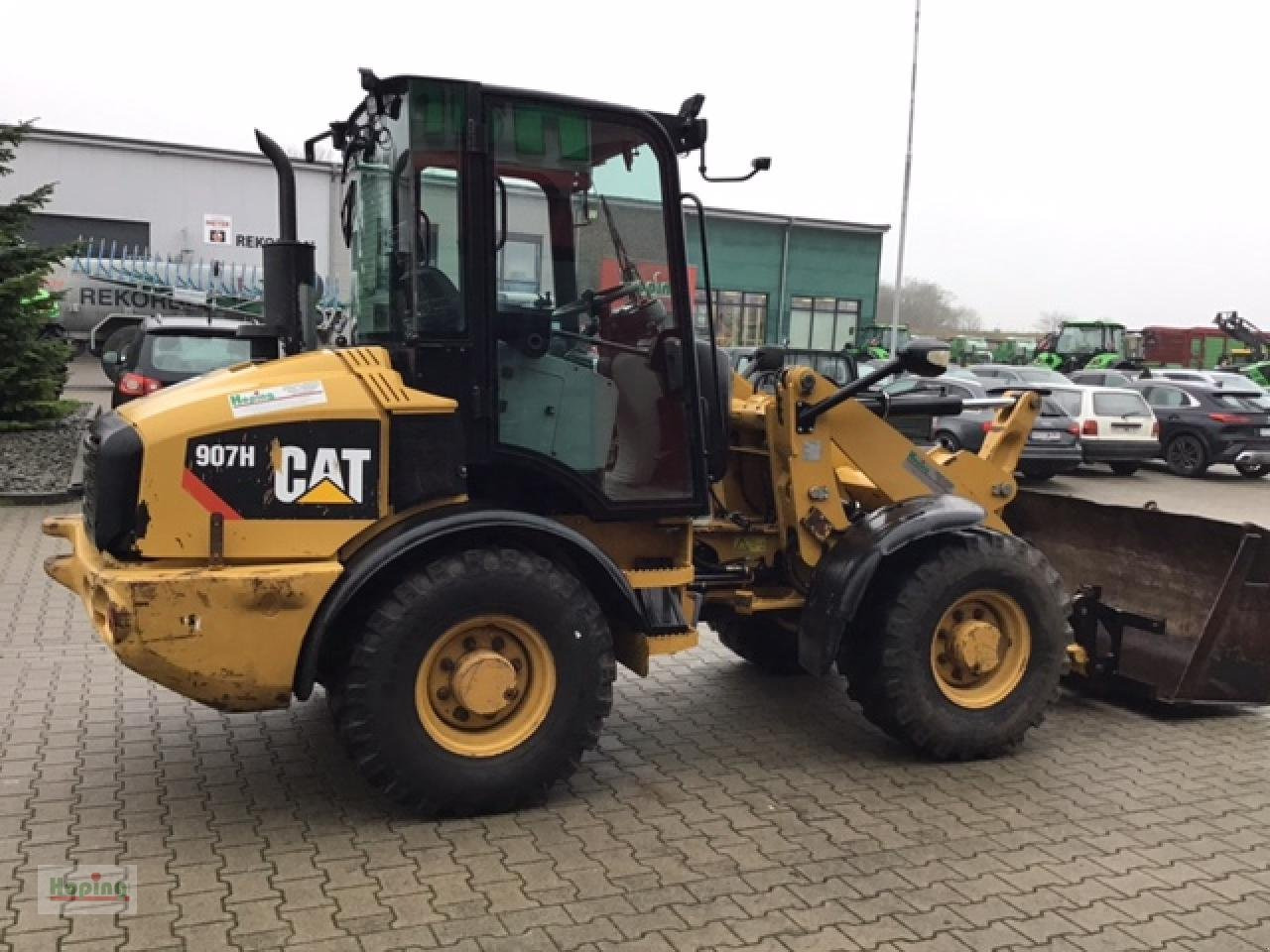 Máy xúc lật bánh lốp Caterpillar 907 H: hình 6