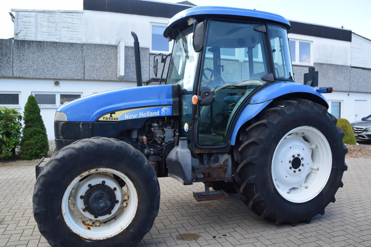 New Holland TD 5040 - Máy cày: hình 1 New Holland TD 5040 - Máy cày: hình 1