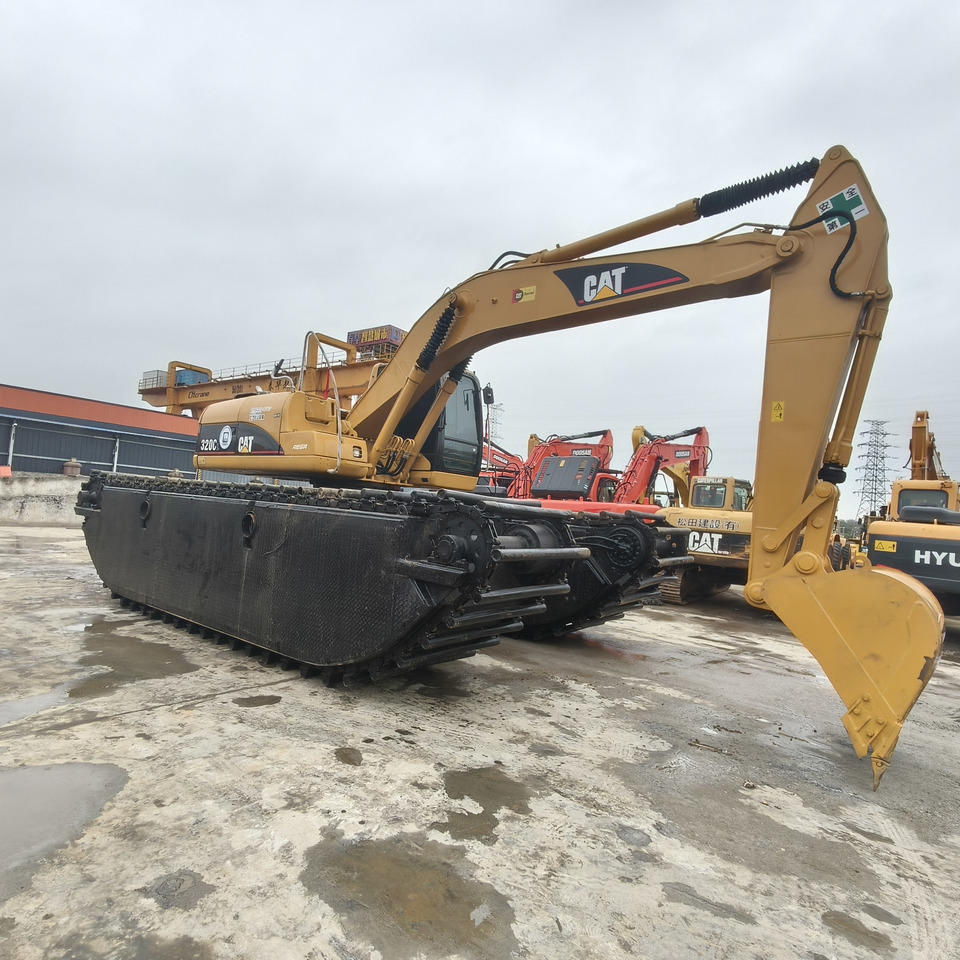CAT 320C - Máy cạp lưỡng cư: hình 2 CAT 320C - Máy cạp lưỡng cư: hình 2