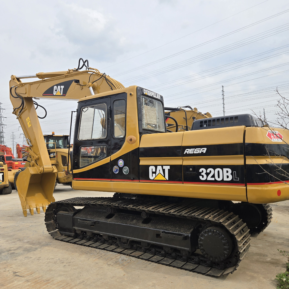 CATERPILLAR 320BL - Máy xúc bánh xích: hình 1 CATERPILLAR 320BL - Máy xúc bánh xích: hình 1