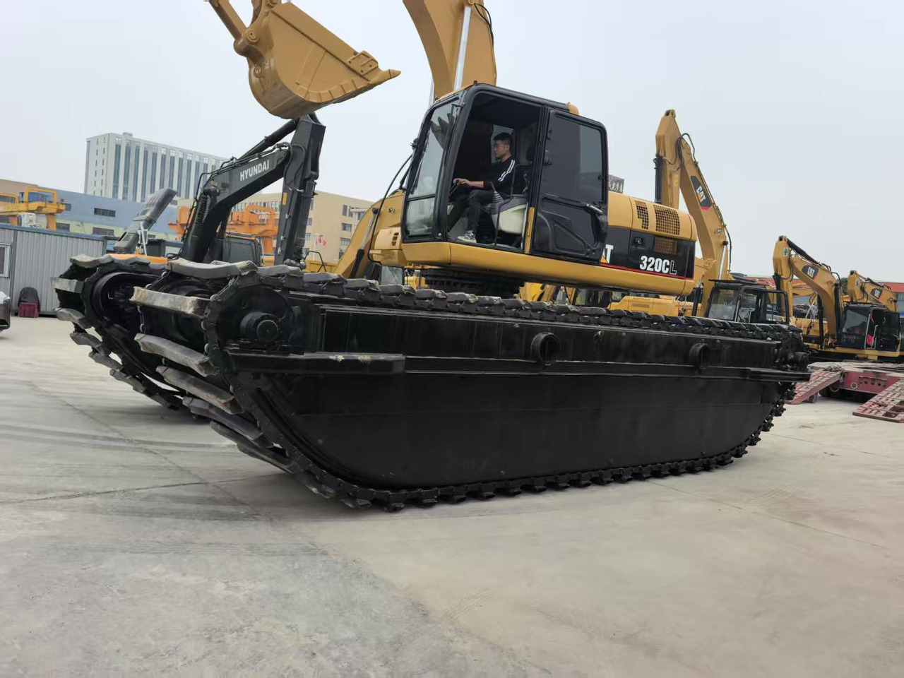CATERPILLAR 320C boat excavator - Máy cạp lưỡng cư: hình 2 CATERPILLAR 320C boat excavator - Máy cạp lưỡng cư: hình 2