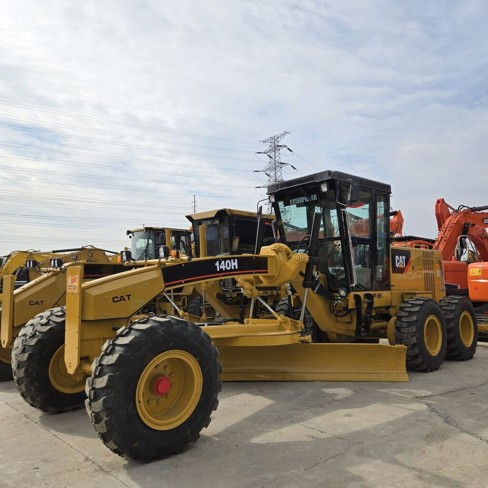 Caterpillar 140H - Máy san: hình 1 Caterpillar 140H - Máy san: hình 1