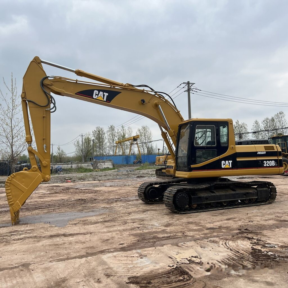 Caterpillar 320BL - Máy xúc bánh xích: hình 1 Caterpillar 320BL - Máy xúc bánh xích: hình 1