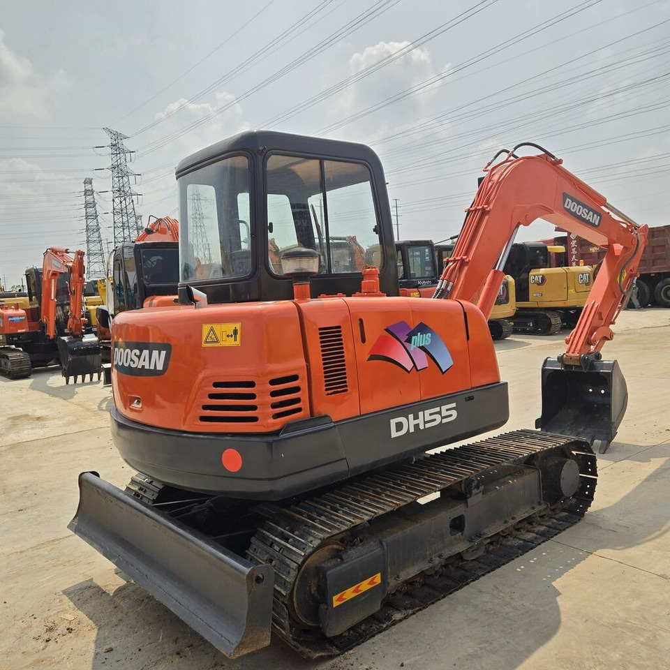 Doosan DH55 - Máy xúc mini: hình 1 Doosan DH55 - Máy xúc mini: hình 1