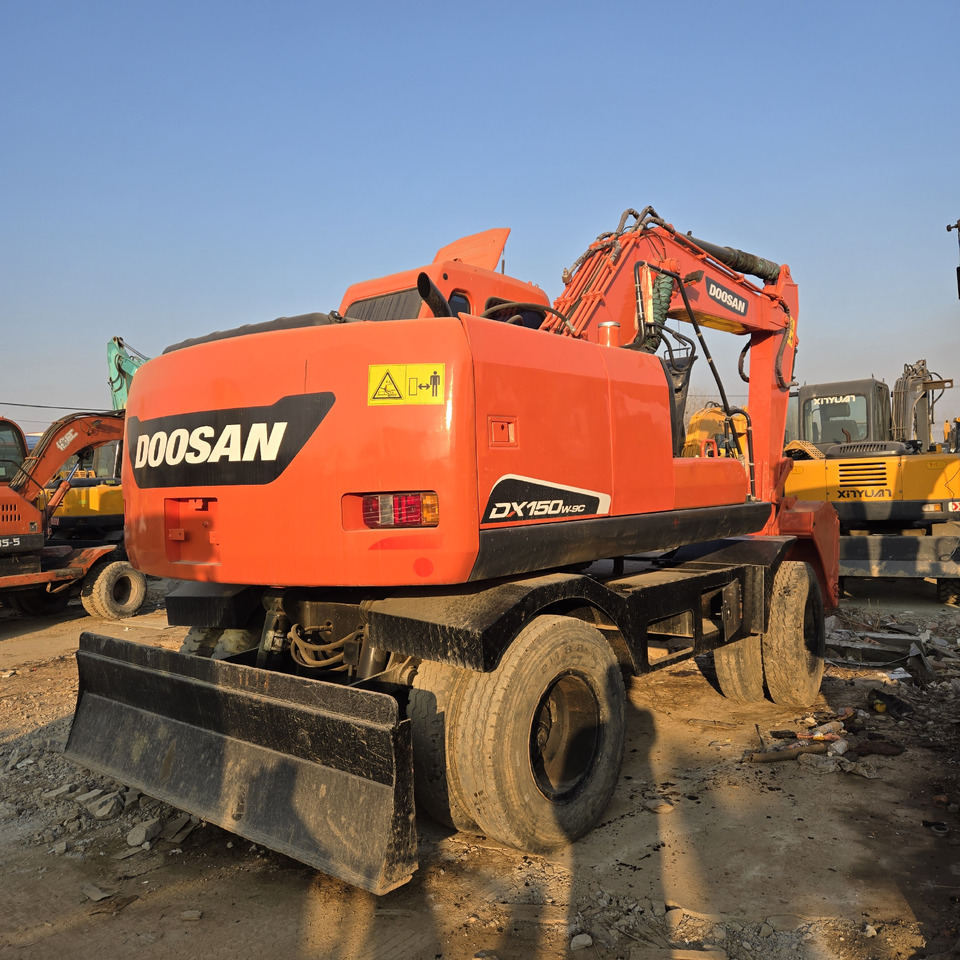 Doosan DX150W-9C - Máy xúc bánh lốp: hình 5 Doosan DX150W-9C - Máy xúc bánh lốp: hình 5