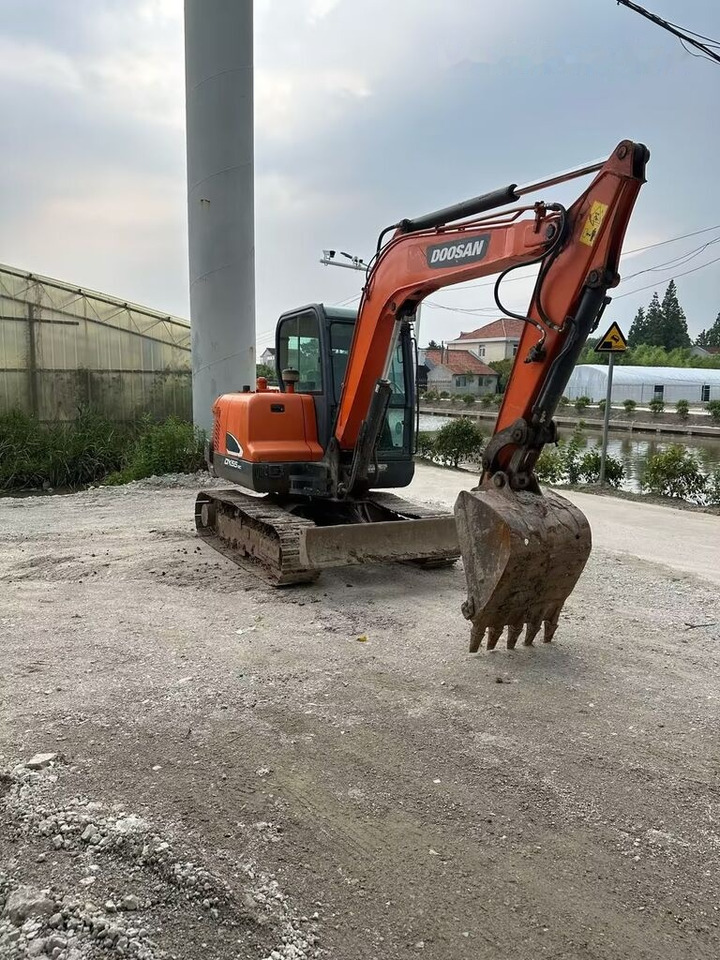 Doosan DX55 - Máy xúc mini: hình 4 Doosan DX55 - Máy xúc mini: hình 4