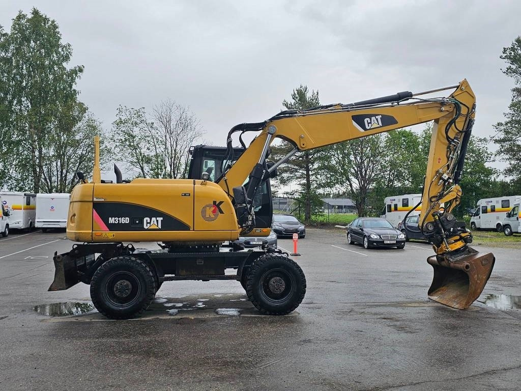 CAT M 316 D - Máy xúc bánh lốp: hình 5 CAT M 316 D - Máy xúc bánh lốp: hình 5