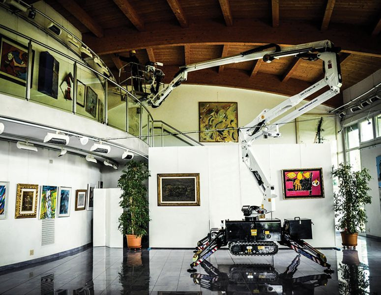 Oil&Steel Octopus 14 podnośnik koszowy na gąsienicach 14 m - Xe nâng người chân nhện bánh: hình 2 Oil&Steel Octopus 14 podnośnik koszowy na gąsienicach 14 m - Xe nâng người chân nhện bánh: hình 2