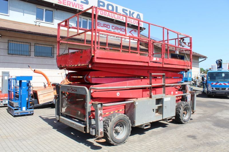 Podnośnik nożycowy 4x4 spalinowy 17 m Skyjack SJ9250 - Máy nâng người hình kéo: hình 1 Podnośnik nożycowy 4x4 spalinowy 17 m Skyjack SJ9250 - Máy nâng người hình kéo: hình 1