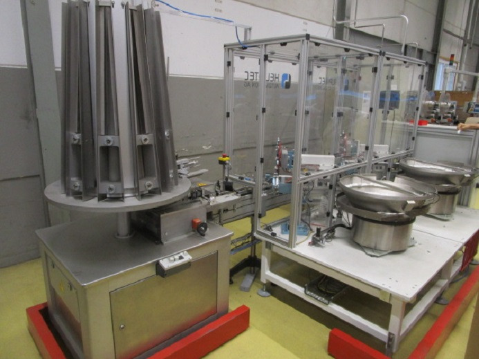 DECKEL ETIKETTIER ANLAGE SCHLEUTER GU 2 DO MIT 2xLÖFFELEINLEGESTATIONEN - Máy đóng gói: hình 1 DECKEL ETIKETTIER ANLAGE SCHLEUTER GU 2 DO MIT 2xLÖFFELEINLEGESTATIONEN - Máy đóng gói: hình 1
