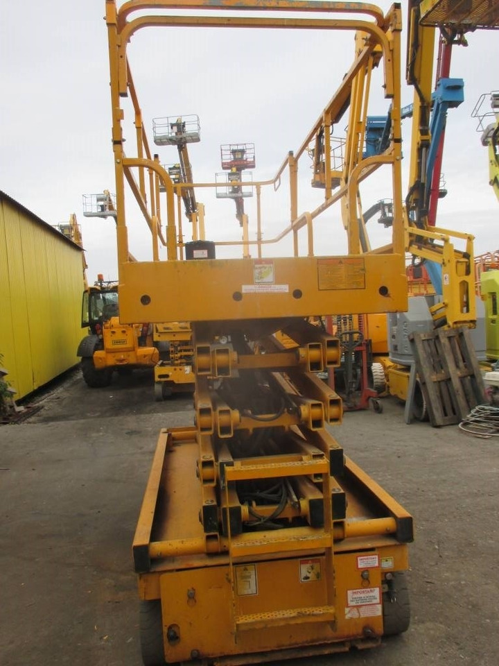 Haulotte Compact 12  - Máy nâng người hình kéo: hình 3 Haulotte Compact 12  - Máy nâng người hình kéo: hình 3