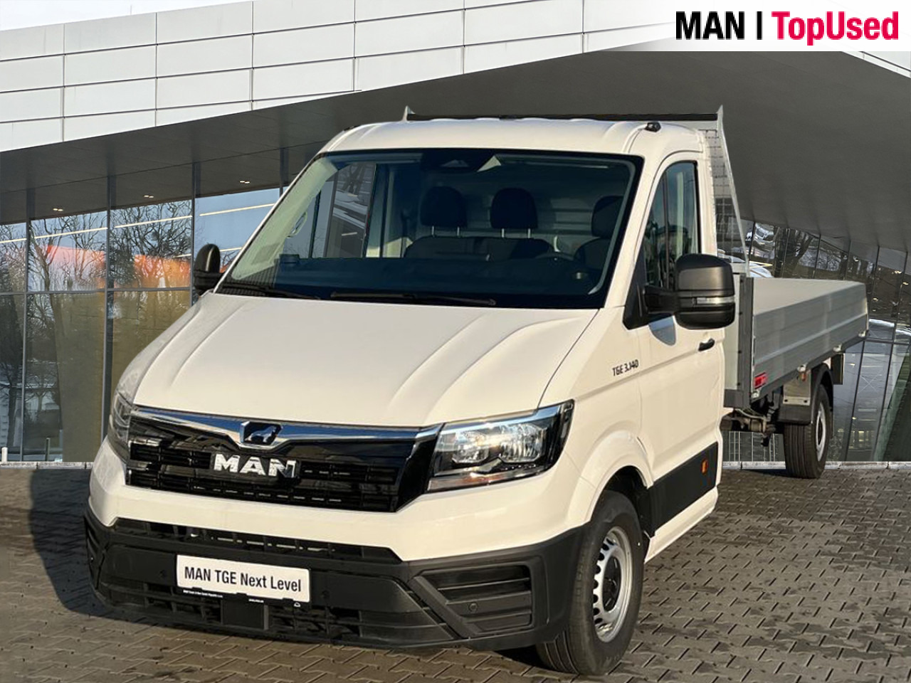 MAN TGE 3.140 4X2F SB flatbed - Xe van chở hàng: hình 1 MAN TGE 3.140 4X2F SB flatbed - Xe van chở hàng: hình 1