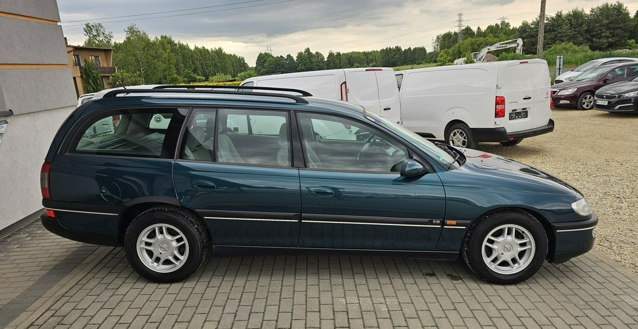 Opel Omega B 2,5 v6 *automat* napęd tył *welury* - Xe hơi: hình 5 Opel Omega B 2,5 v6 *automat* napęd tył *welury* - Xe hơi: hình 5