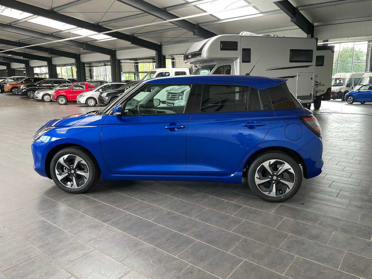 Suzuki Swift 1.2 DUALJET HYBRID Comfort+ - Xe hơi: hình 5 Suzuki Swift 1.2 DUALJET HYBRID Comfort+ - Xe hơi: hình 5