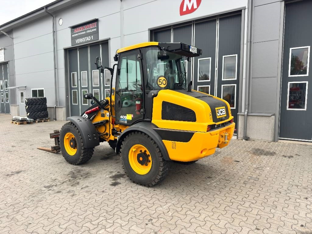 JCB 409 - Máy xúc lật bánh lốp: hình 3 JCB 409 - Máy xúc lật bánh lốp: hình 3