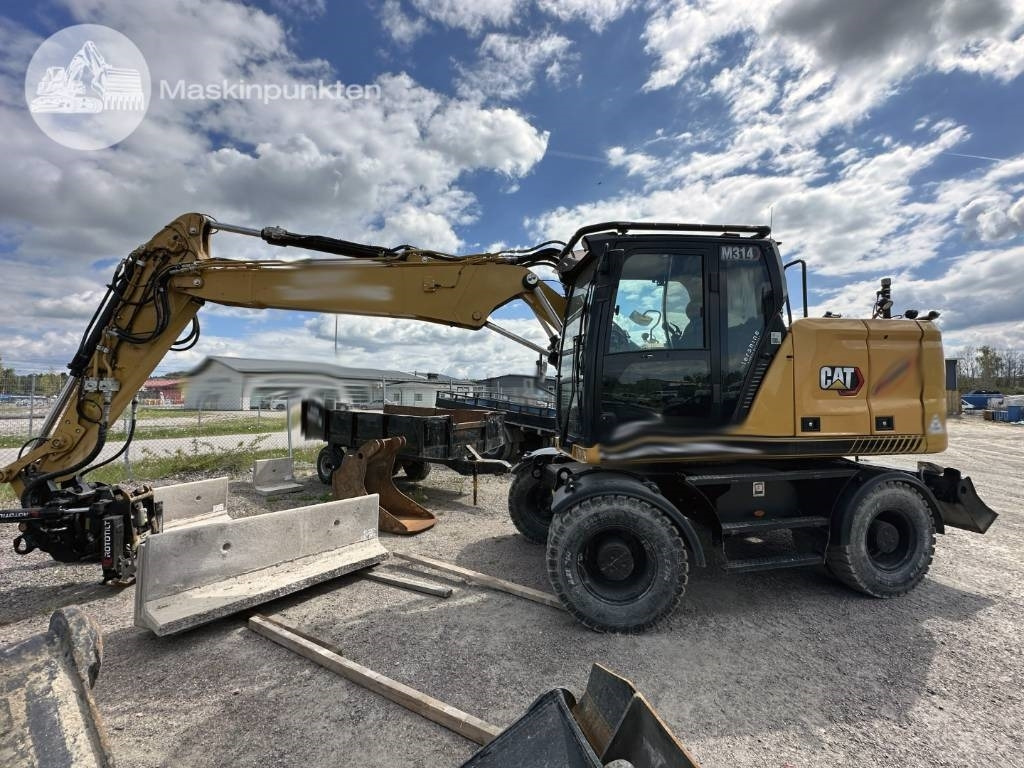 CAT M 314 - Máy xúc bánh lốp: hình 2 CAT M 314 - Máy xúc bánh lốp: hình 2