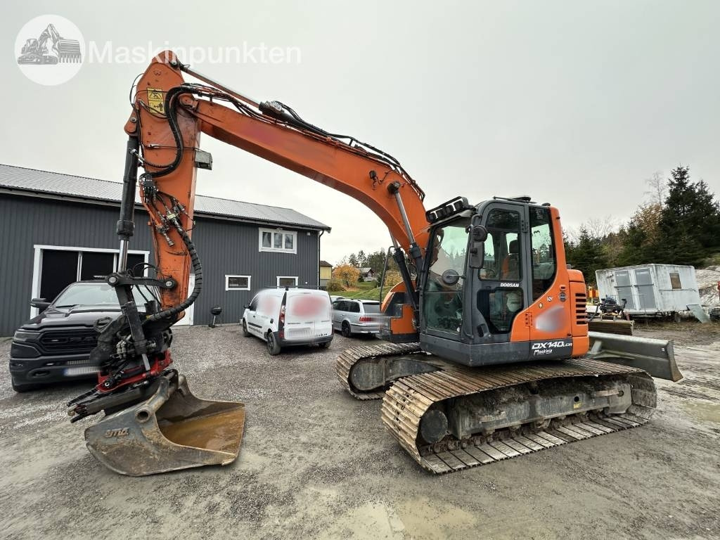 Doosan DX 140 LCR-5 - Máy xúc bánh xích: hình 1 Doosan DX 140 LCR-5 - Máy xúc bánh xích: hình 1