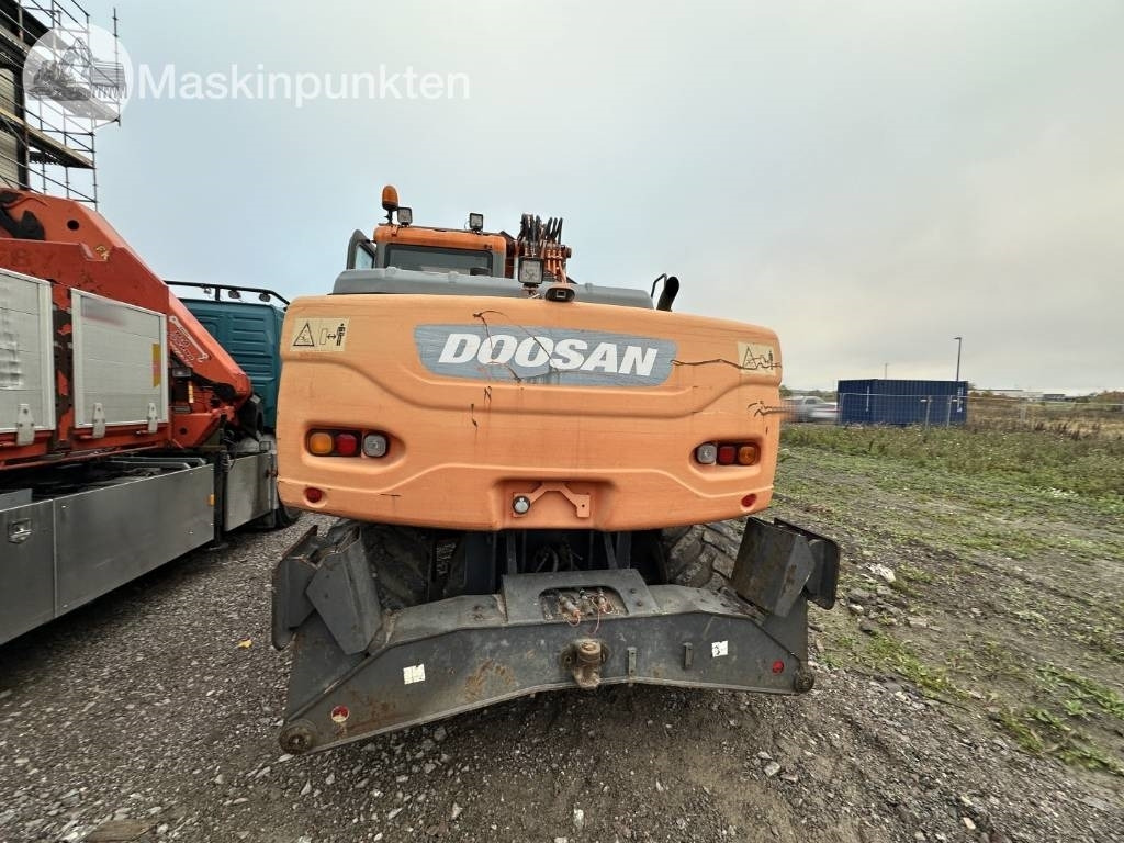 Doosan DX 140 W med vagn och redskap  - Máy xúc bánh lốp: hình 5 Doosan DX 140 W med vagn och redskap  - Máy xúc bánh lốp: hình 5