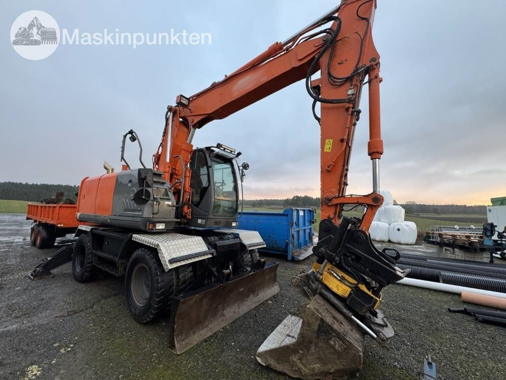 Hitachi ZX 140 W-3 Med vagn och redskap! - Máy xúc bánh lốp: hình 4 Hitachi ZX 140 W-3 Med vagn och redskap! - Máy xúc bánh lốp: hình 4
