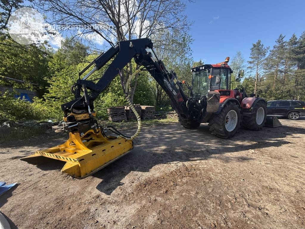 Huddig 1260 B - Máy xúc trước múc sau: hình 1 Huddig 1260 B - Máy xúc trước múc sau: hình 1