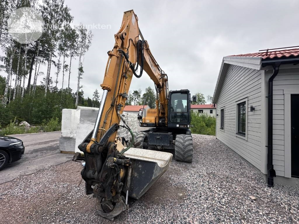 Hyundai Robex 140 W-7 A - Máy xúc bánh lốp: hình 2 Hyundai Robex 140 W-7 A - Máy xúc bánh lốp: hình 2
