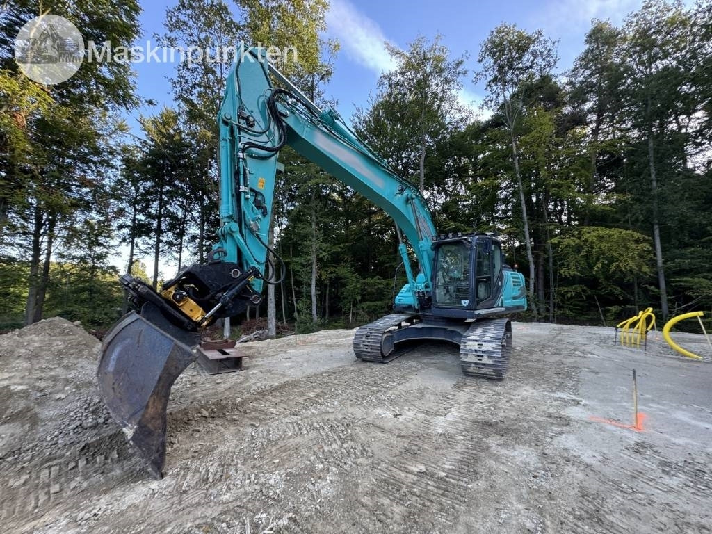 Kobelco SK 210 LC-10 - Máy xúc bánh xích: hình 1 Kobelco SK 210 LC-10 - Máy xúc bánh xích: hình 1