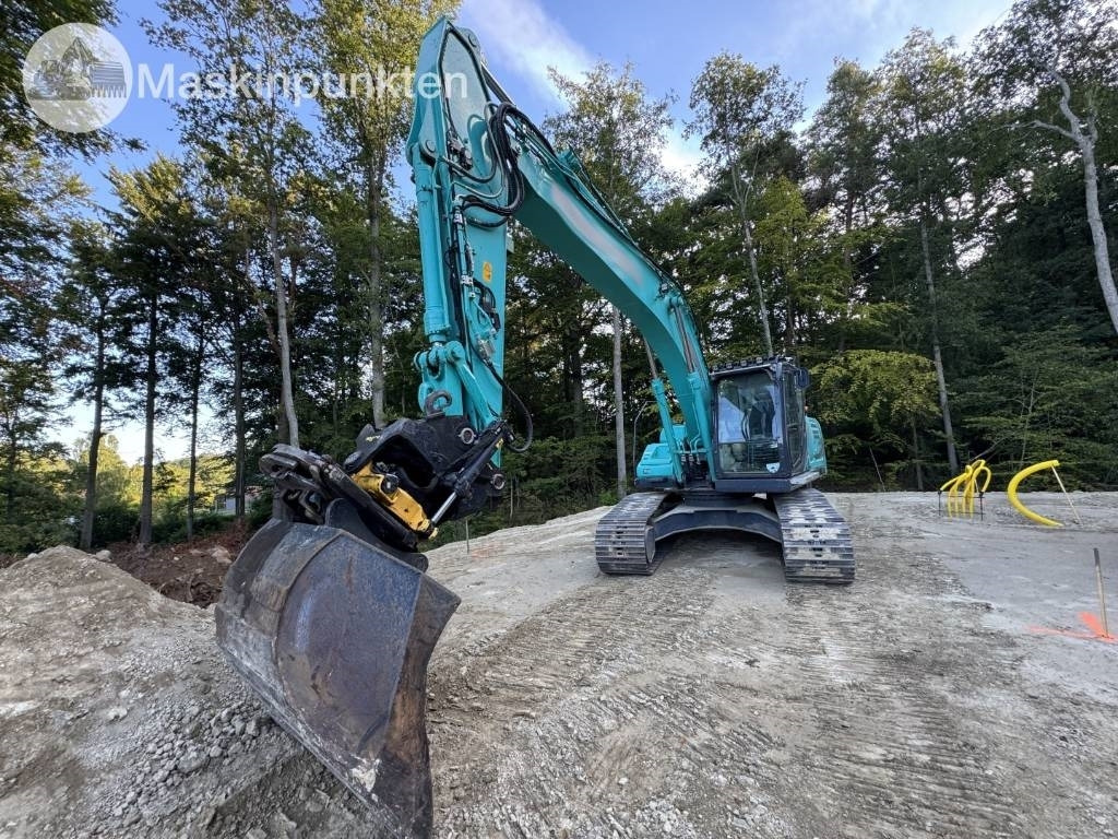 Kobelco SK 210 LC-10 - Máy xúc bánh xích: hình 5 Kobelco SK 210 LC-10 - Máy xúc bánh xích: hình 5