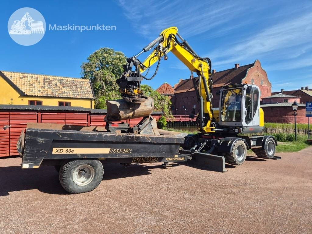 Wacker Neuson EW 100 med vagn - Máy xúc bánh lốp: hình 1 Wacker Neuson EW 100 med vagn - Máy xúc bánh lốp: hình 1