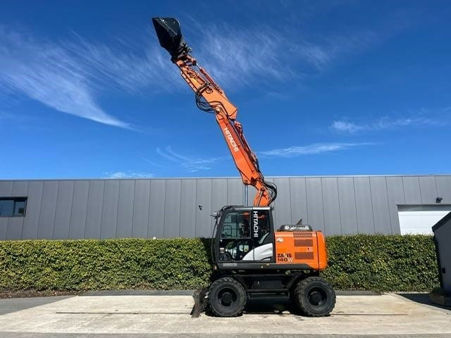 Hitachi 140W - Máy xúc bánh lốp: hình 2 Hitachi 140W - Máy xúc bánh lốp: hình 2