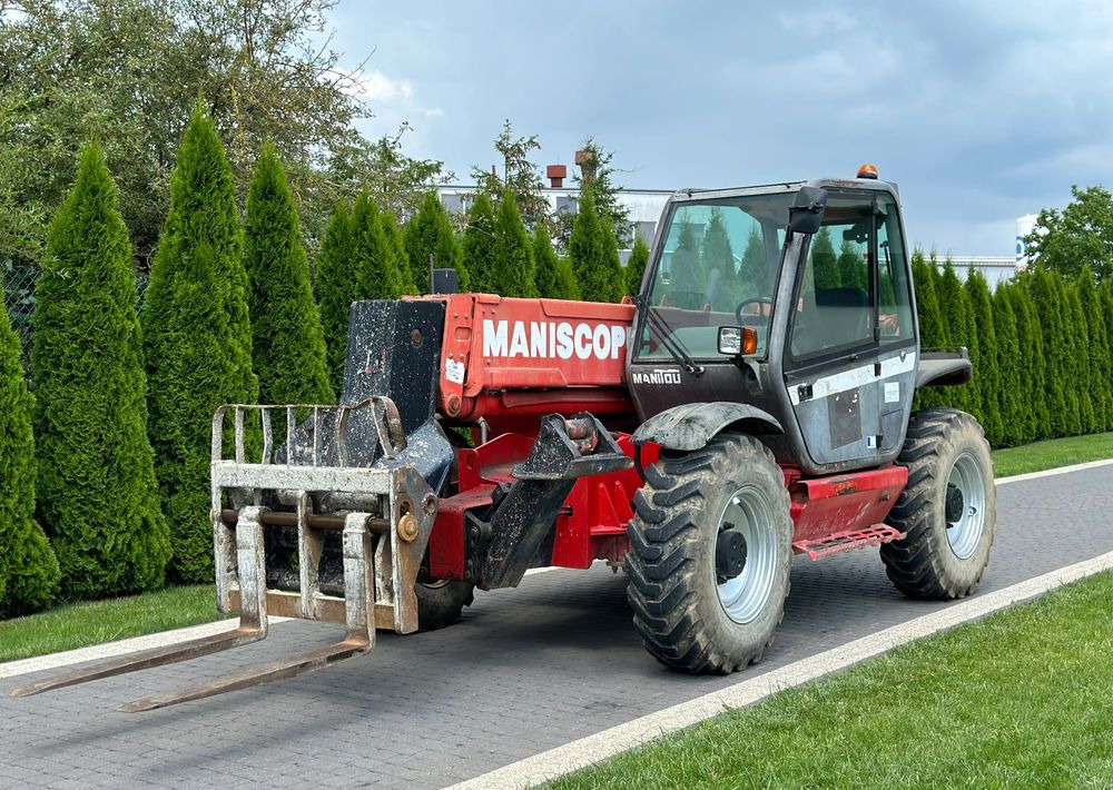 Manitou MT 1233S 12 M - Xe nhấc hình viễn vọng kính: hình 1 Manitou MT 1233S 12 M - Xe nhấc hình viễn vọng kính: hình 1