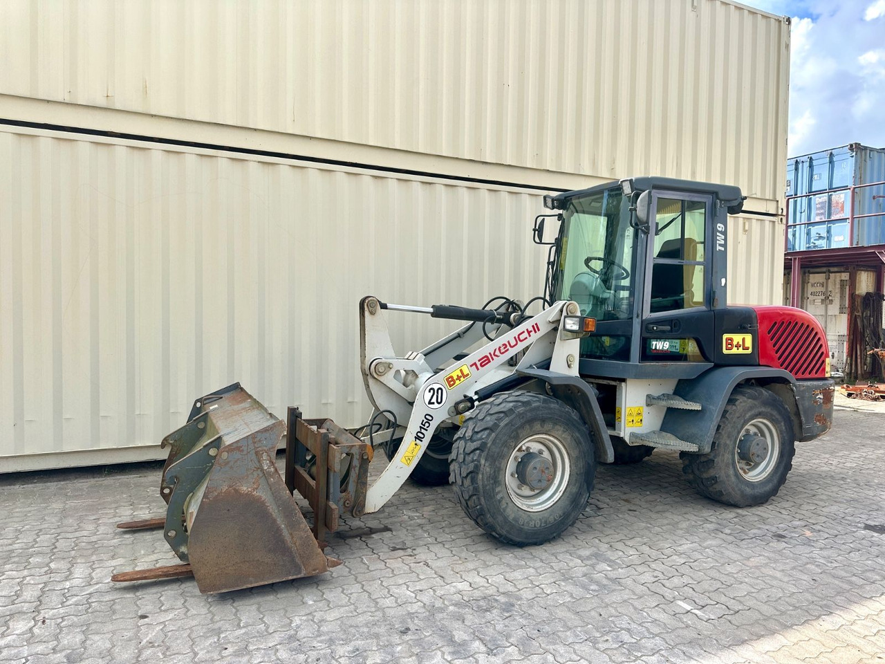 Takeuchi TW9 /4.800 KG /Deutsche Maschine /Gabel+Schaufel - Máy xúc lật bánh lốp: hình 1 Takeuchi TW9 /4.800 KG /Deutsche Maschine /Gabel+Schaufel - Máy xúc lật bánh lốp: hình 1
