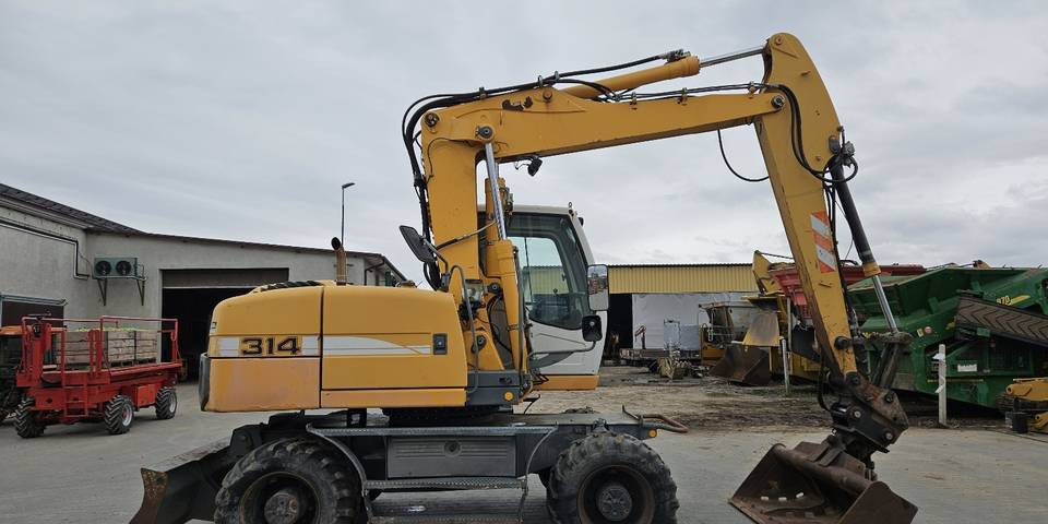 Koparka kołowa Liebherr A314 Litronic 9350 h 4 łyżki kołówka - Máy xúc bánh lốp: hình 5 Koparka kołowa Liebherr A314 Litronic 9350 h 4 łyżki kołówka - Máy xúc bánh lốp: hình 5