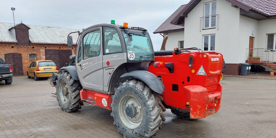 Ładowarka teleskopowa Manitou MT1335 13m 3,5t 2014 - Xe nhấc hình viễn vọng kính: hình 2 Ładowarka teleskopowa Manitou MT1335 13m 3,5t 2014 - Xe nhấc hình viễn vọng kính: hình 2