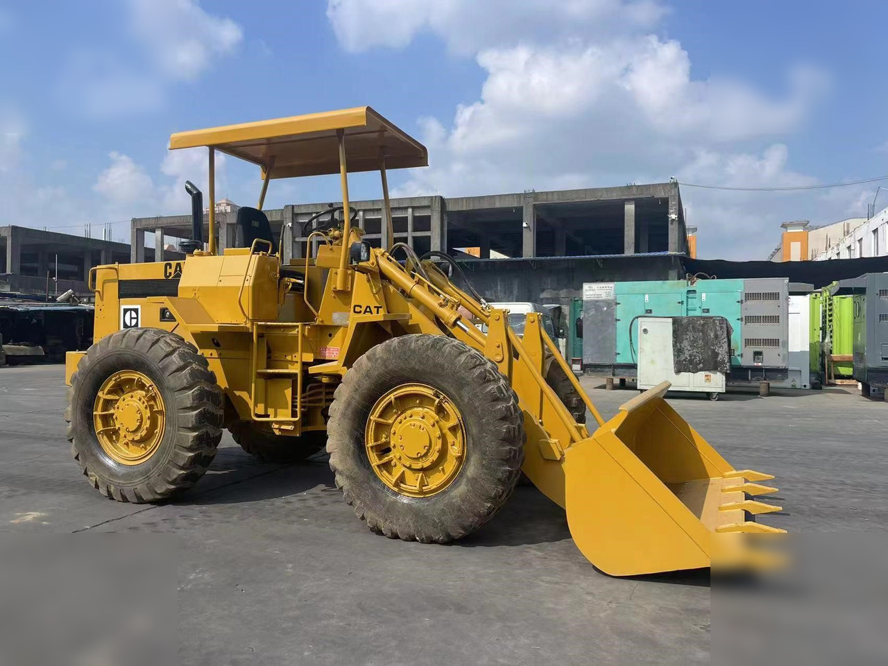CATERPILLAR 910 - Máy xúc lật bánh lốp: hình 2 CATERPILLAR 910 - Máy xúc lật bánh lốp: hình 2