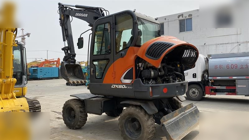 DOOSAN DX60W ECO - Máy xúc bánh lốp: hình 4 DOOSAN DX60W ECO - Máy xúc bánh lốp: hình 4