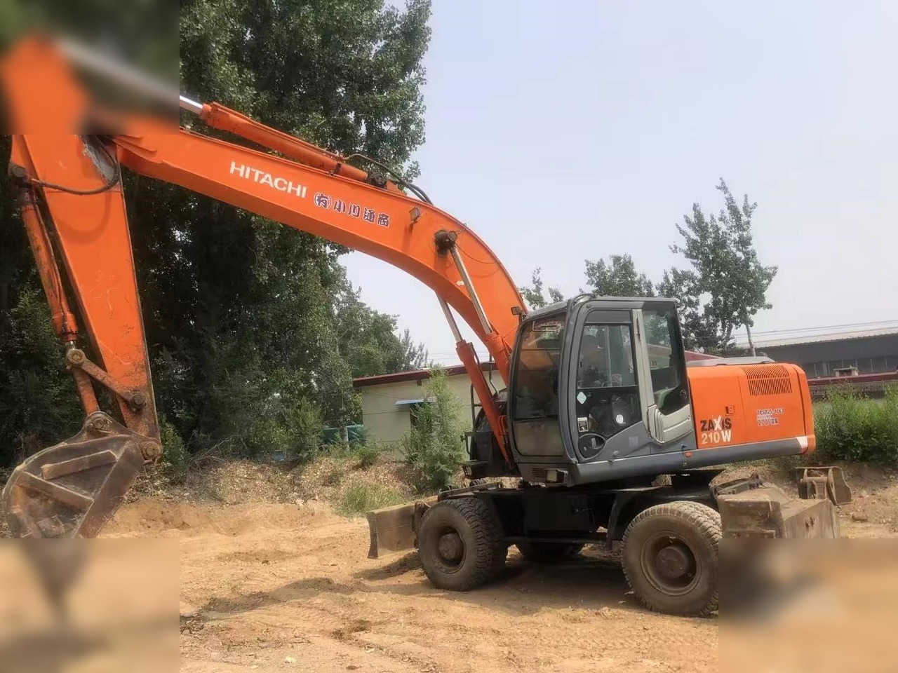 HITACHI ZX210W - Máy xúc bánh lốp: hình 3 HITACHI ZX210W - Máy xúc bánh lốp: hình 3