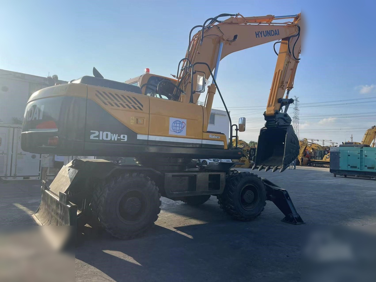 HYUNDAI ROBEX 210W-9 - Máy xúc bánh lốp: hình 2 HYUNDAI ROBEX 210W-9 - Máy xúc bánh lốp: hình 2