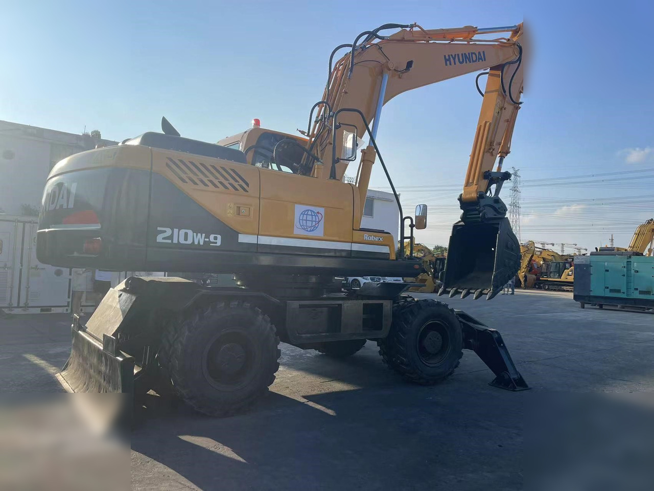 HYUNDAI ROBEX 210W-9 - Máy xúc bánh lốp: hình 2 HYUNDAI ROBEX 210W-9 - Máy xúc bánh lốp: hình 2