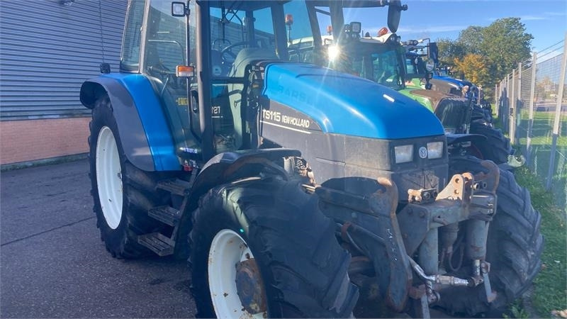 New Holland TS115 - Máy cày: hình 1 New Holland TS115 - Máy cày: hình 1